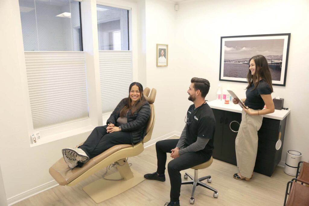 Feusier staff talking to patient