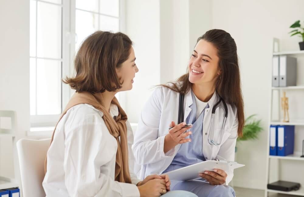 Professional help, positive young female practitioner doctor