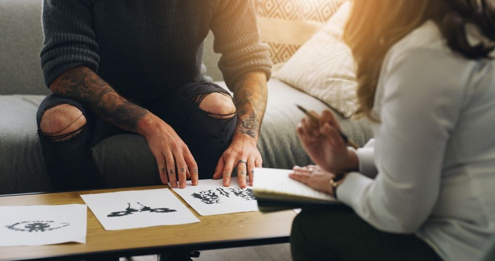 Therapist, hands or inkblot test for psychology evaluation, personality assessment or emotion