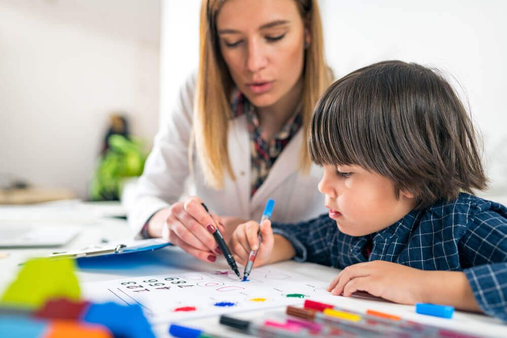 Toddler girl in child occupational therapy session