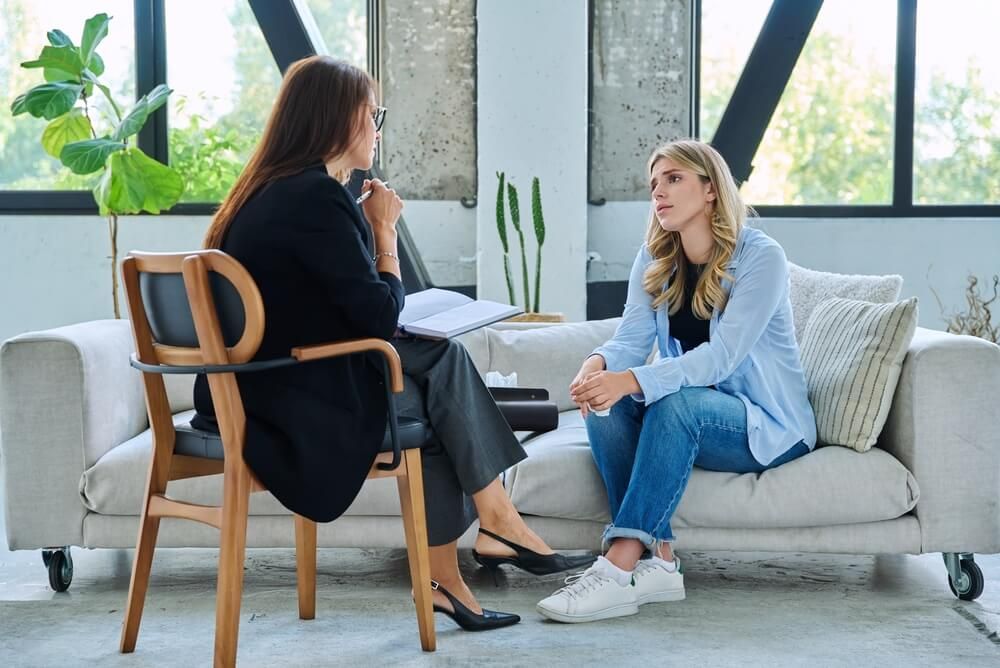 woman talking to therapist