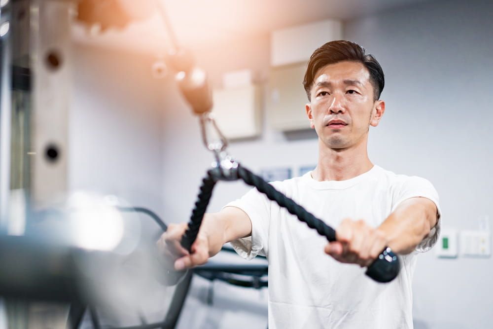 Middle-aged man training in the gym
