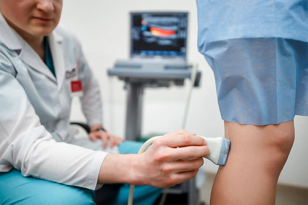 Doctor checking on patient