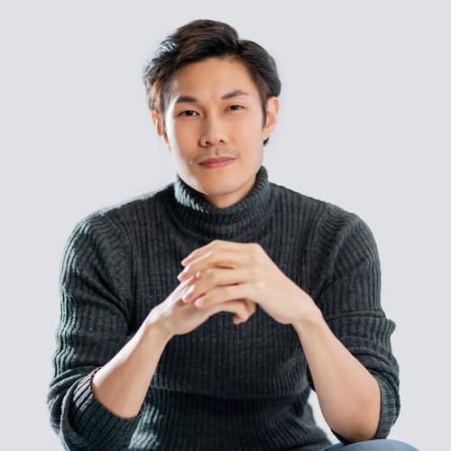Smart active asian male wear sweater smile with positive emotion