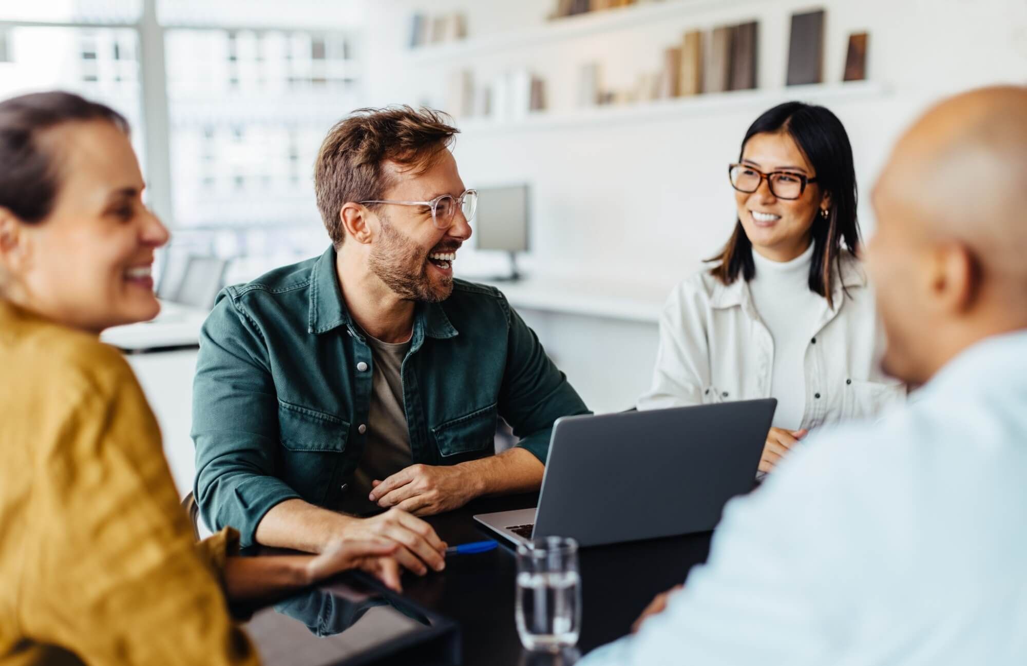 Diverse business people having a team meeting in an office.