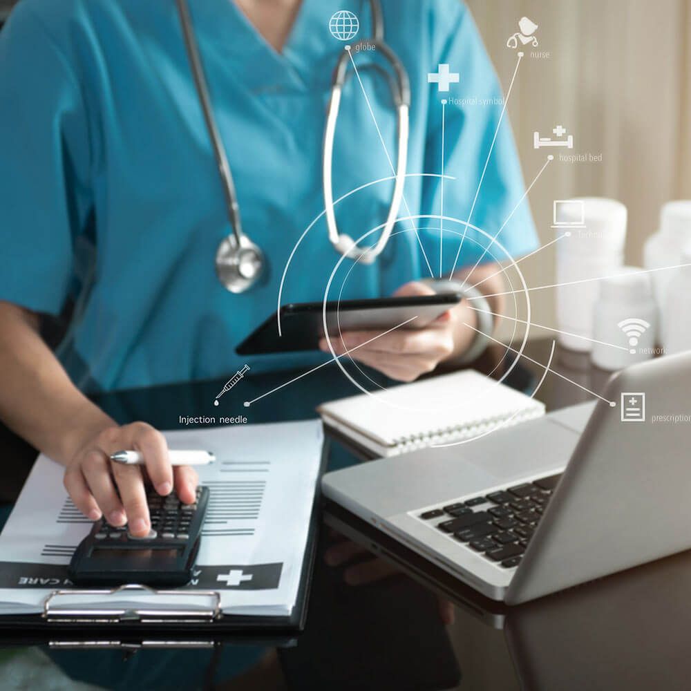 Doctor or accounting department writes a note and uses a calculator to calculate expenses - income. of hospital staff.