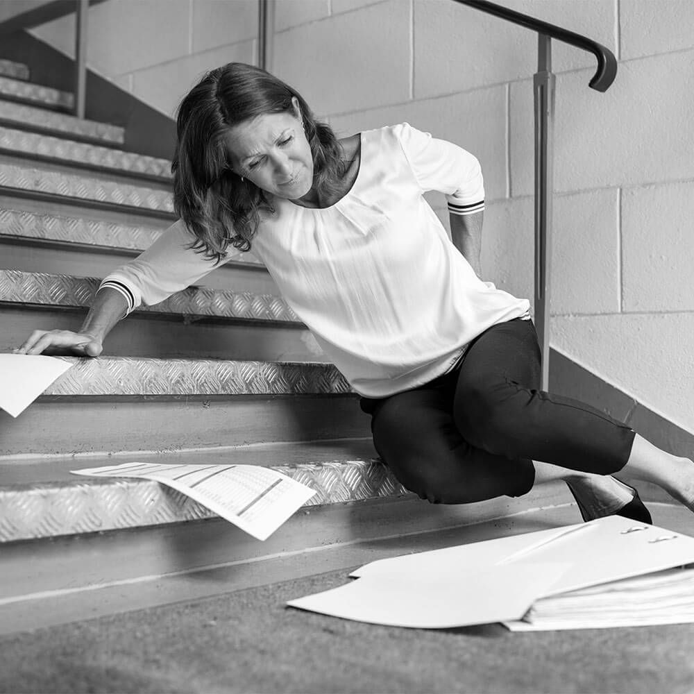 Fall And Fall Injury Accident At Workplace. Woman Fell Down Stairs