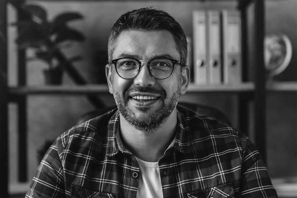 Smiling business man looking camera webcam making conference video call