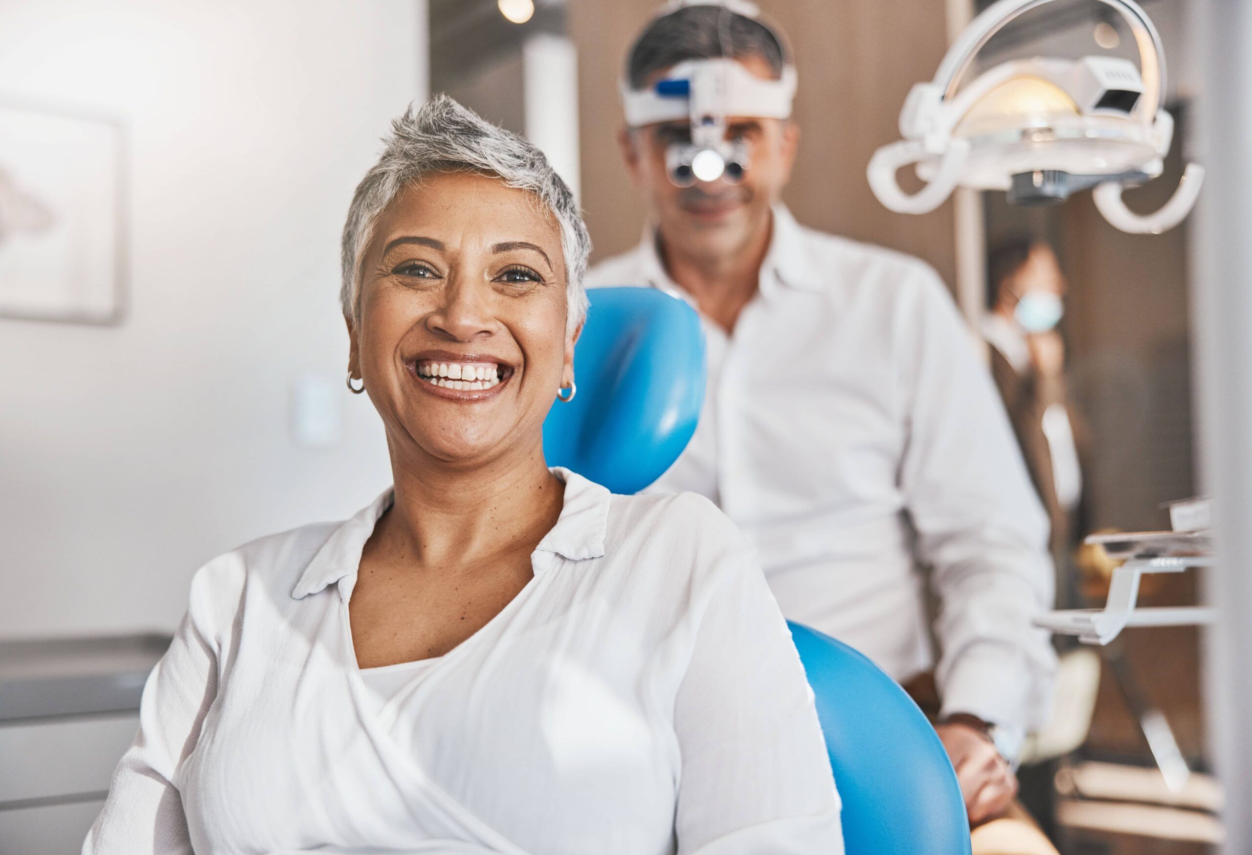 Portrait, happy and dental with a woman patient in a doctor office for oral hygiene or health