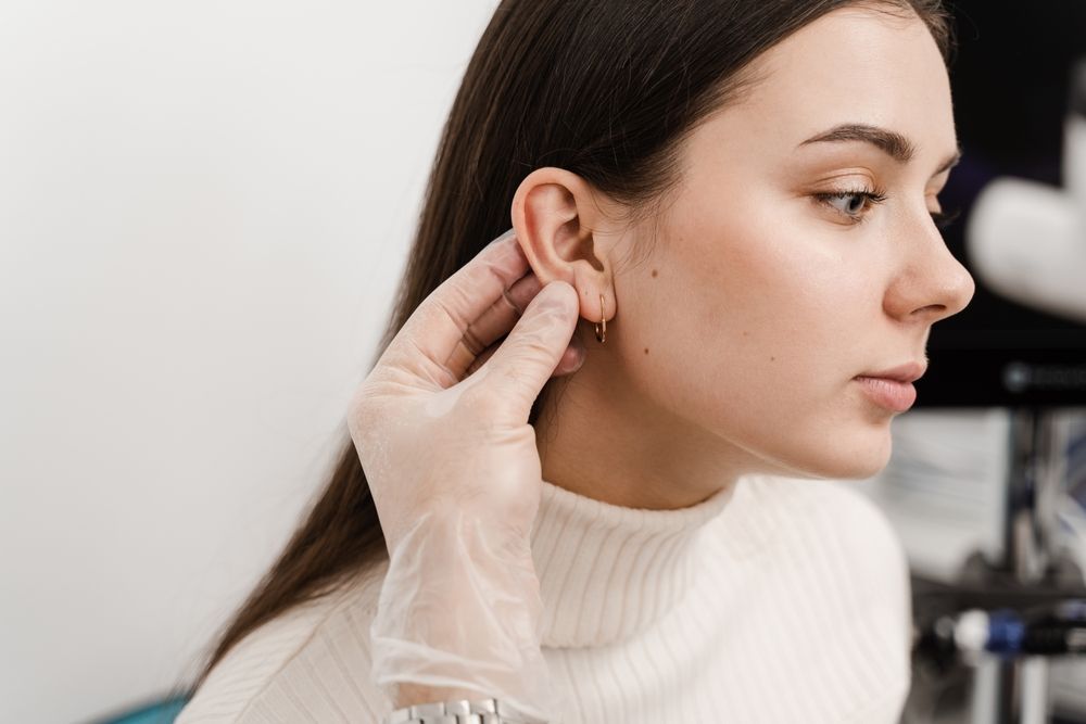 Otoplasty surgical reshaping of pinna and ear. Otoplasty ear surgery.