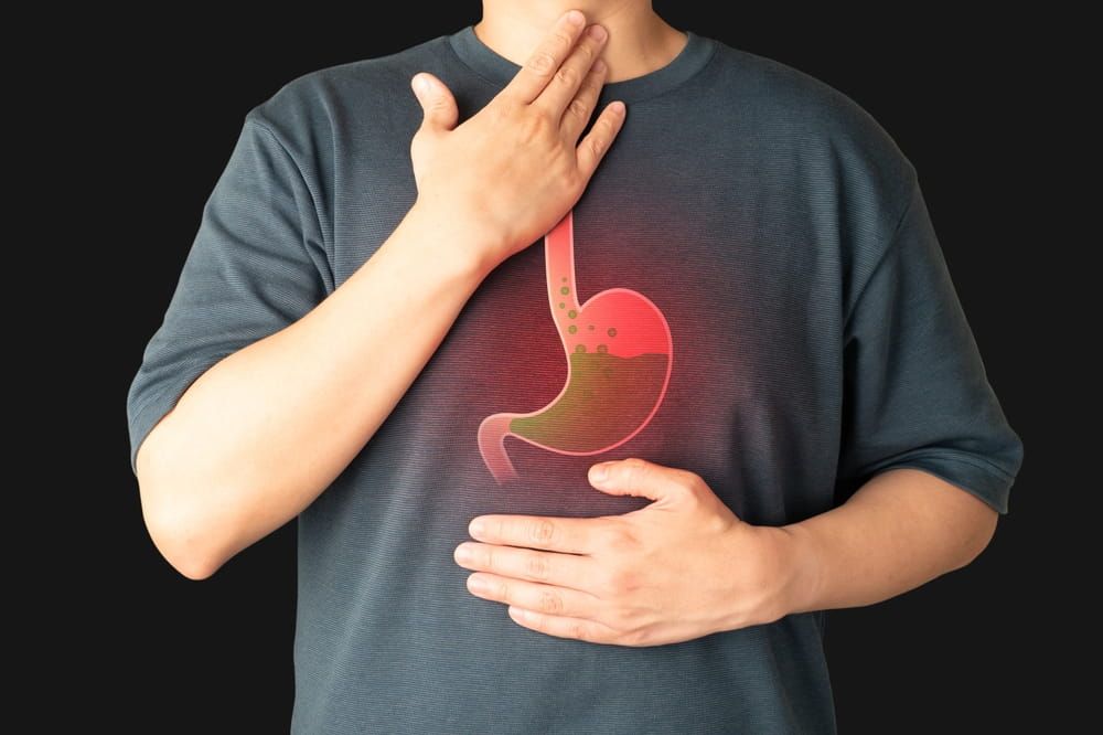 Gastroesophageal reflux disease (GERD) or acid reflux symptoms. Man suffering from heartburn, stomachache