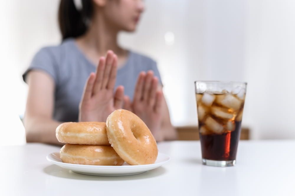 Junk food or unhealthy food such donut sweets or soda drink