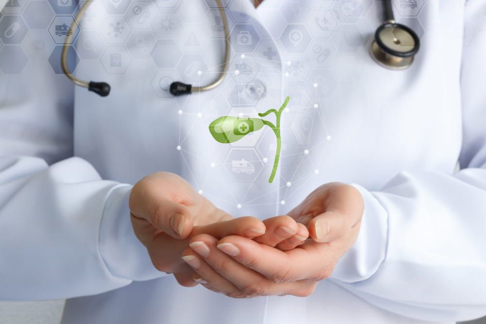 The concept of treatment of the gallbladder. The doctor supports the gallbladder.