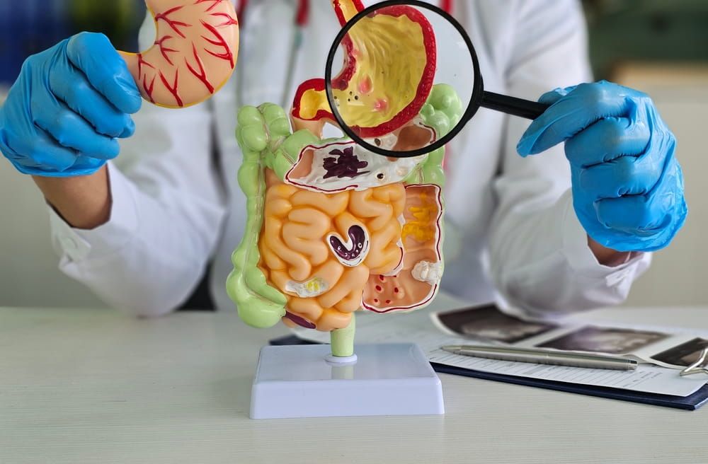 Magnifying glass and colon diseases and colorectal cancer and ulcerative colitis