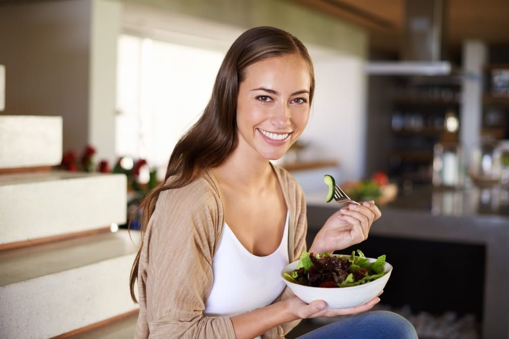 Salad, portrait and happy woman a house with breakfast