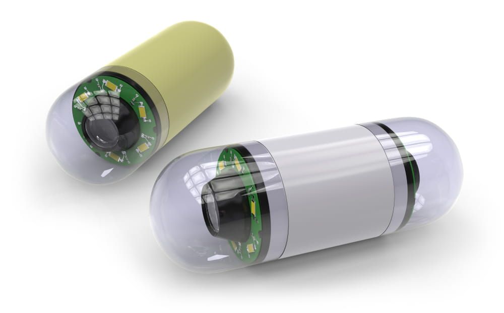 Pill-sized camera for capsule endoscopy isolated on white