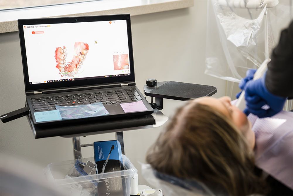 dentist using Intraoral Cameras