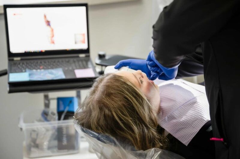 dentist using Intraoral Cameras