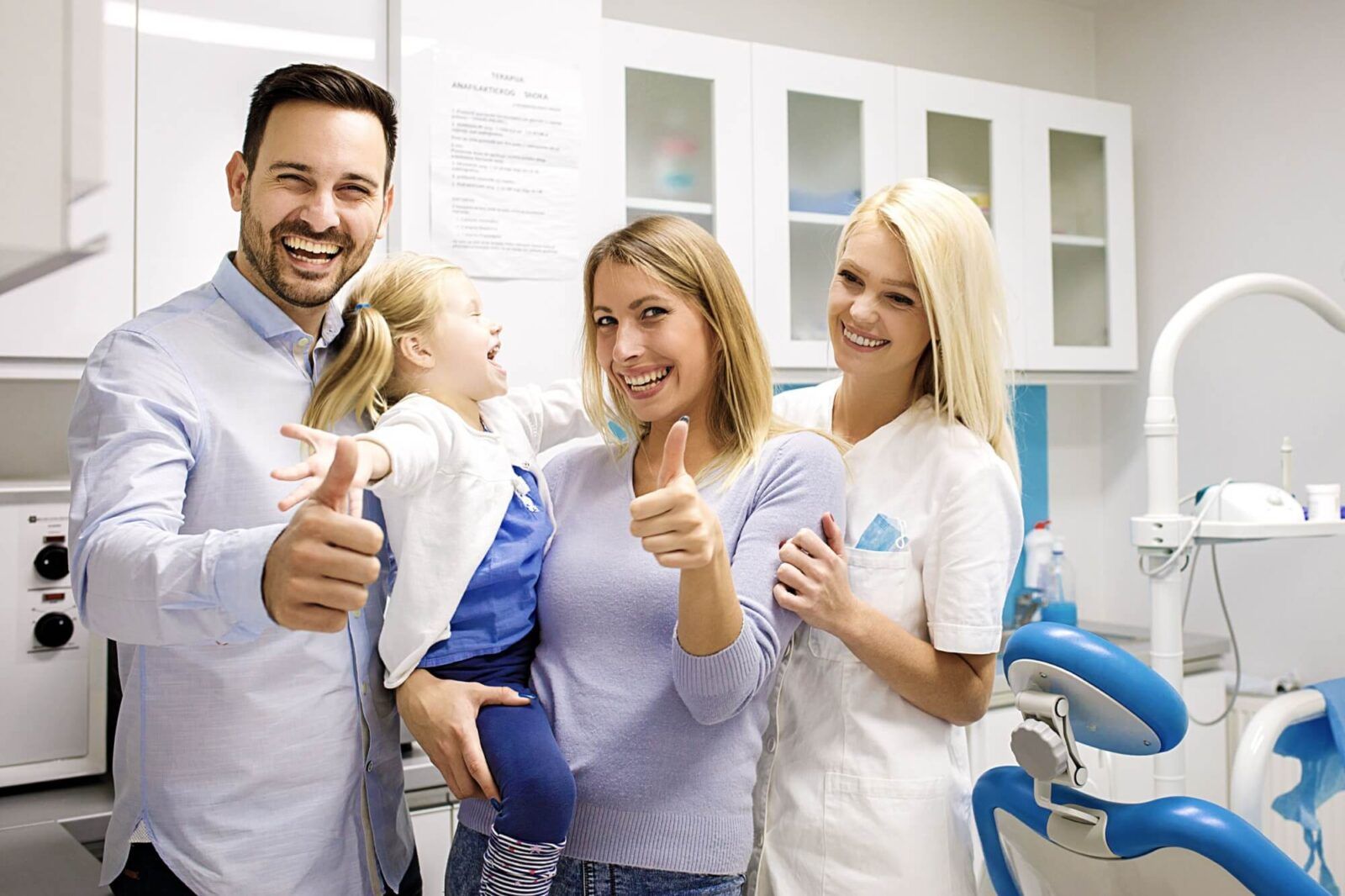 Cute blonde child first time in dental office.