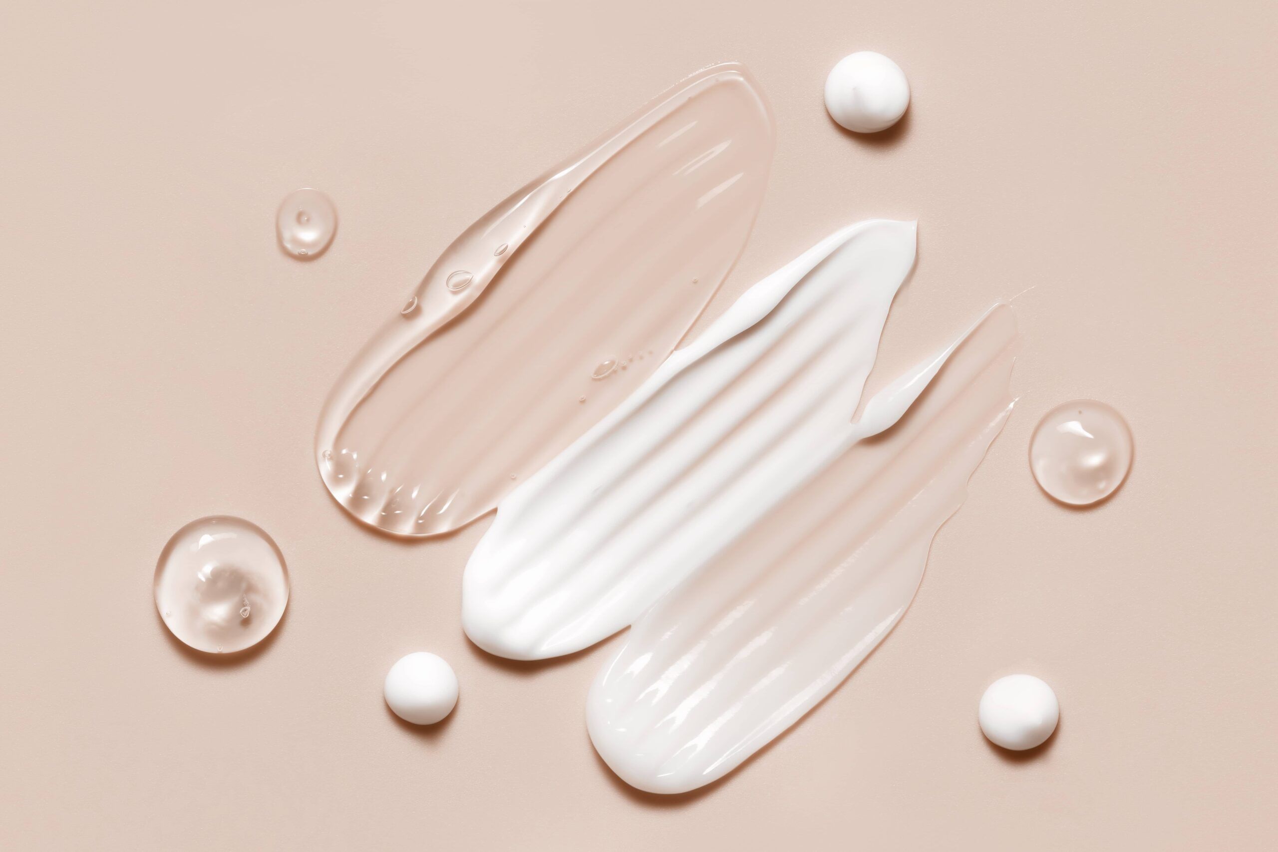 Medical-grade skincare products and hydrating serums displayed in a minimalist flat lay, representing professional skincare, skin rejuvenation, and aesthetic wellness treatments.