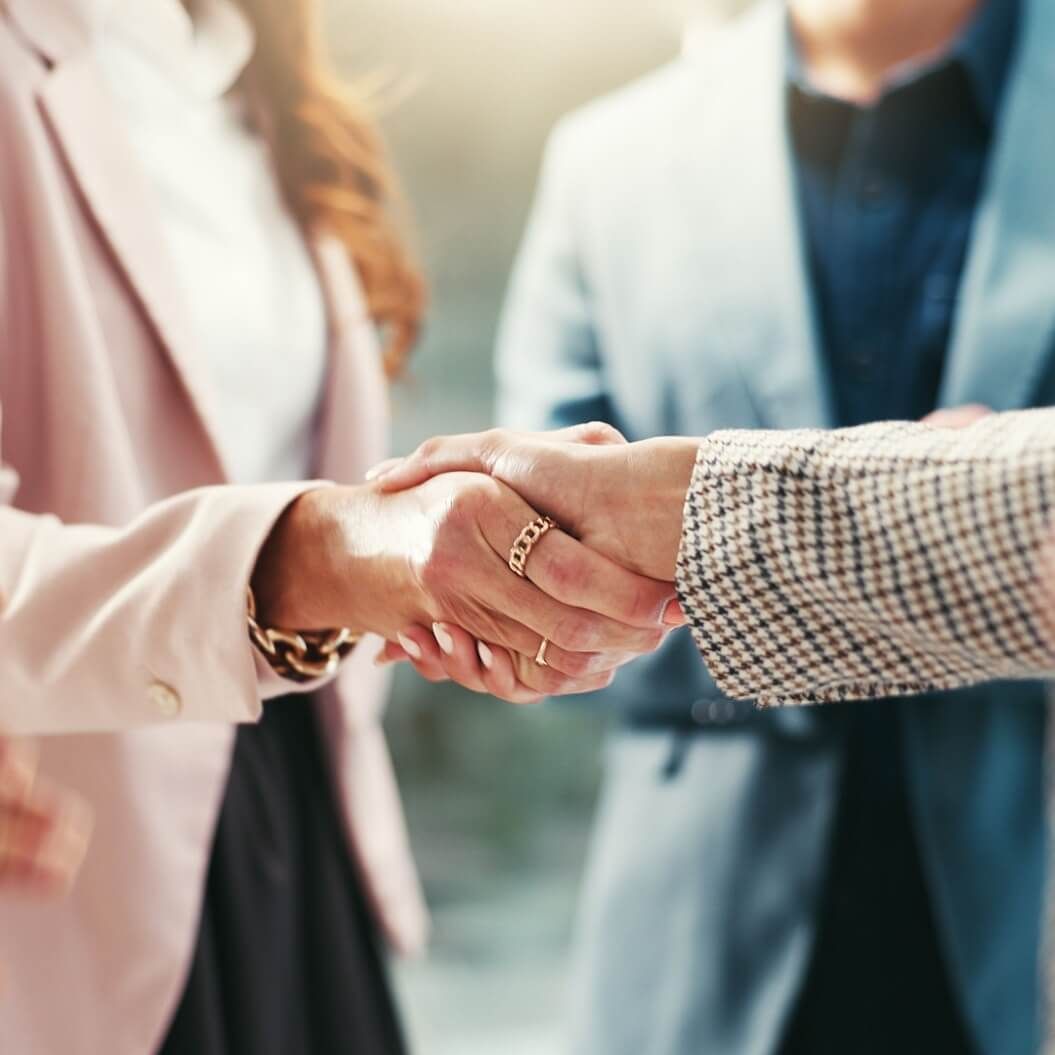 Handshake, meeting and hands of business people in office for teamwork, collaboration and partnership.