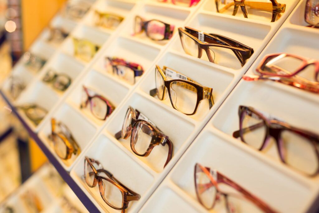 Eyeglasses, shades and sunglasses in optician's shop