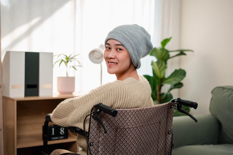 Young woman have a sick with cancer her confident feeling happy lifestyle in living room at home.