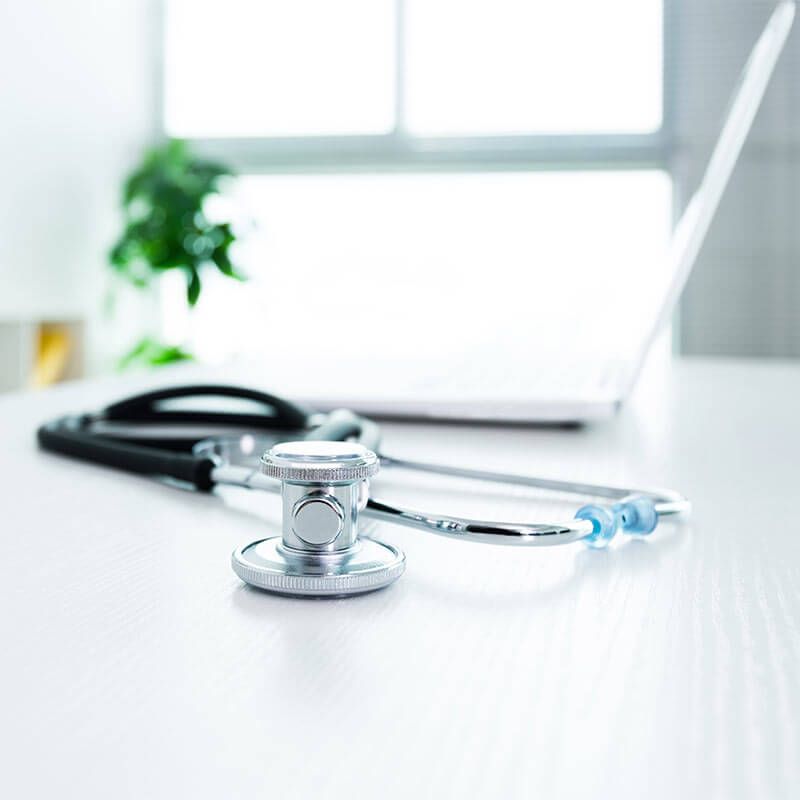 Doctor workplace with a stethoscope at table