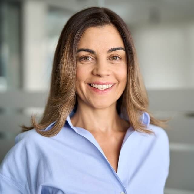 Happy middle aged business woman attorney, smiling 45 years old lady