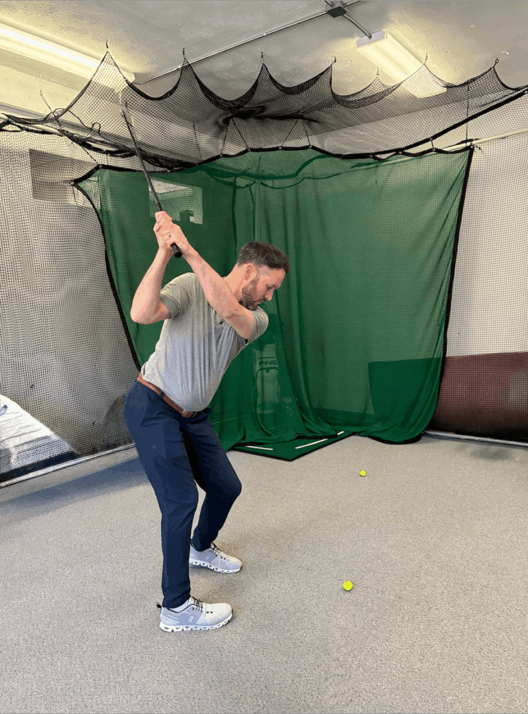 a person practicing a golf swing