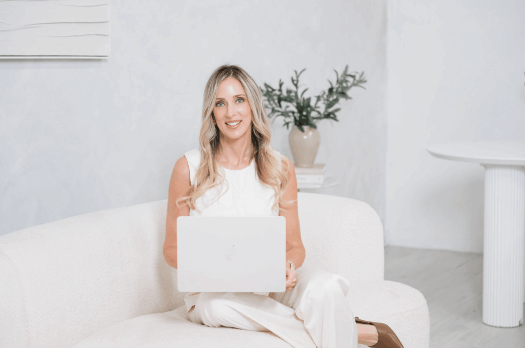 Amber Braithwaite, APRN on laptop