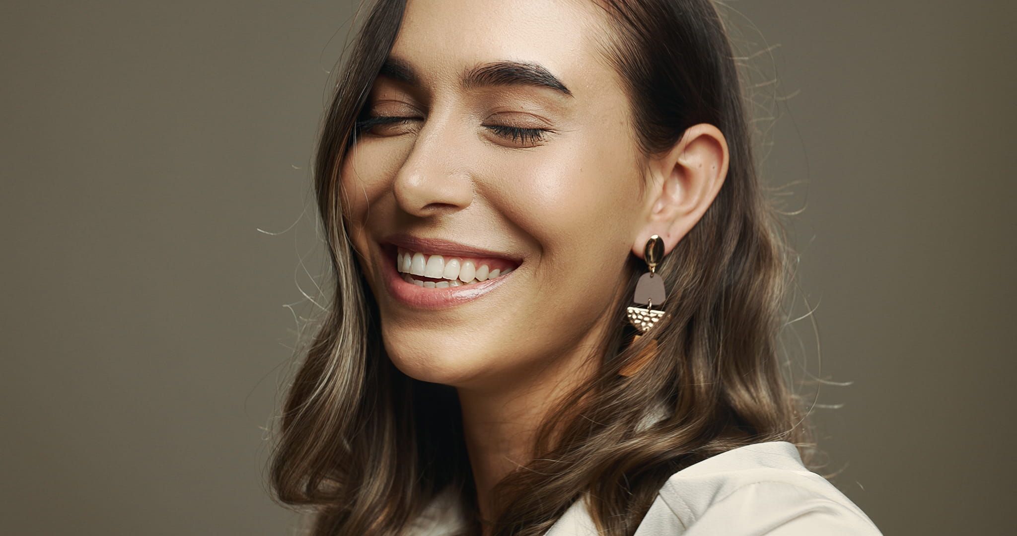 air care, beauty and happy woman in studio for glow, confidence and shine on background space