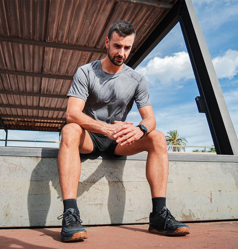 Athletic Man Taking a Break After Intense Workout