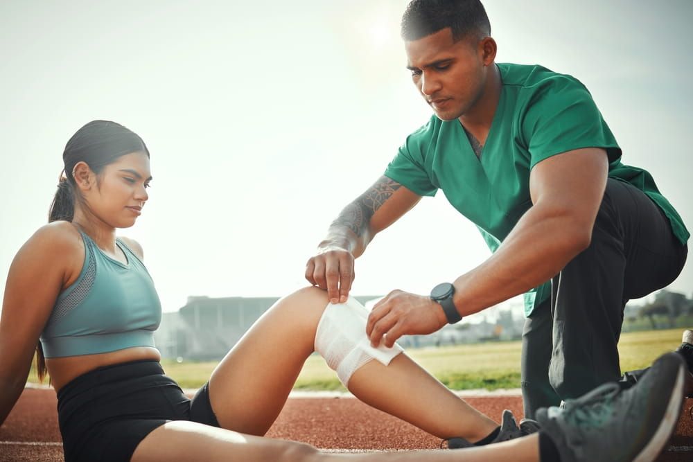 bandage of injury for training, first aid or leg support on track. Field, runner