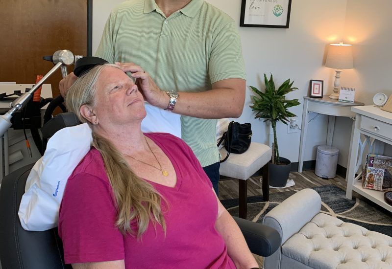 neuronavigation technology to precisely guide the TMS