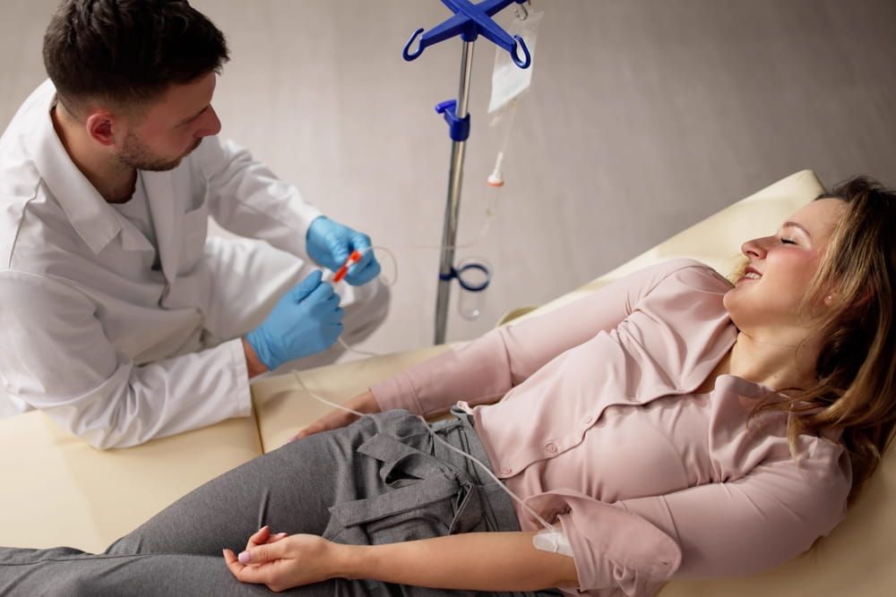 Vitamin Therapy IV Drip Infusion In Man Blood