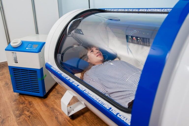 Hyperbaric medicine center. Female at hyperbaric oxygen chamber